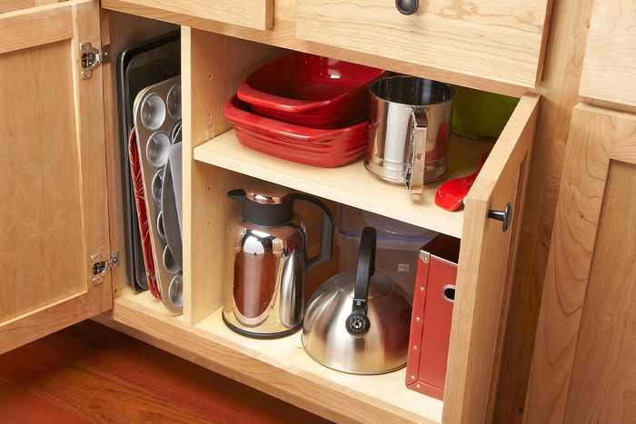 Easy Diy Projects To Increase Kitchen Cabinet And Drawer Storage Add a Divider for Upright Storage