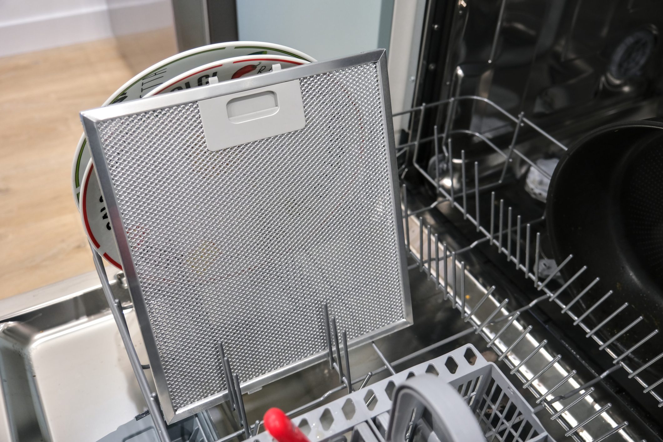 Kitchen hood vent filter, in a dishwasher, for washing