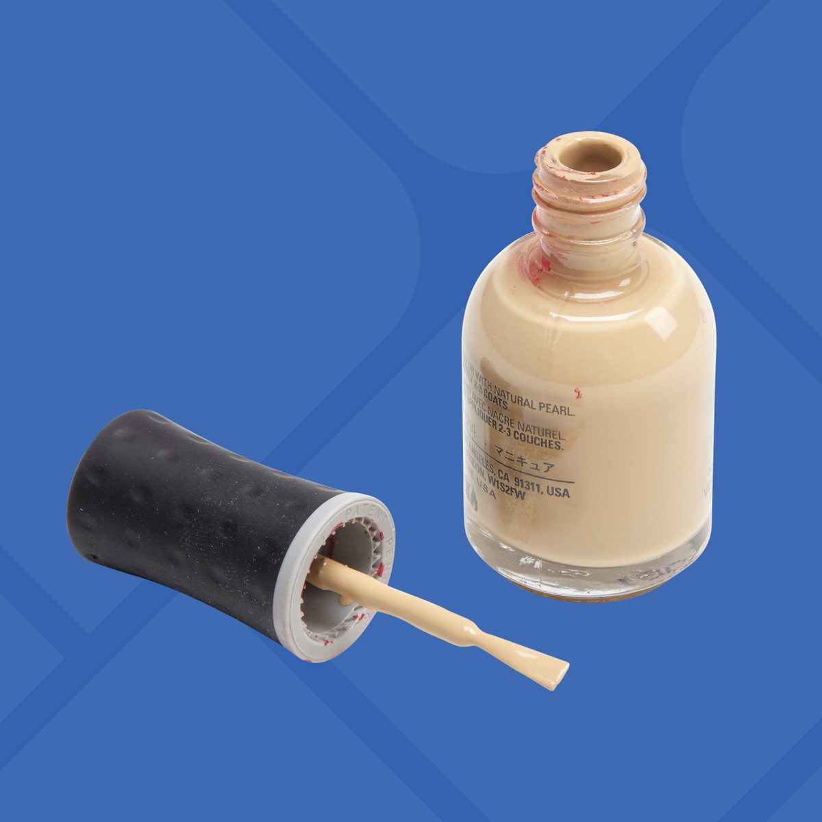 old bottle of nail polish filled with paint