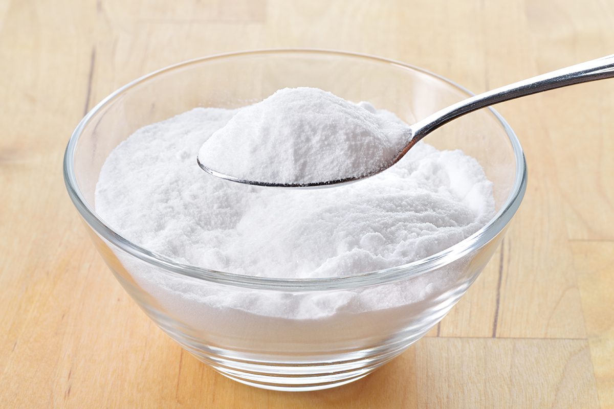 14 Ways To Eliminate Garbage Can Odors Baking Soda Powder Gettyimages 466566705