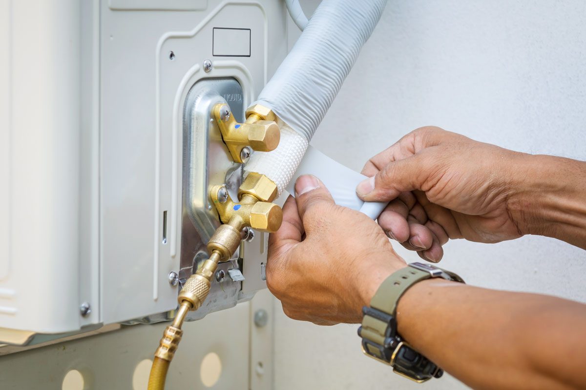 Installing Air Conditioner Gettyimages 1134479285