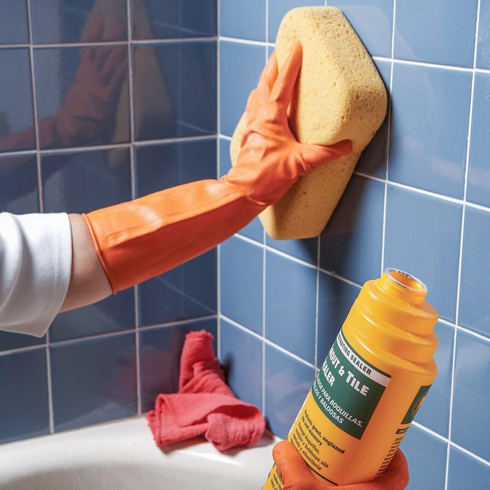 grouting wall with grout and tile sealant