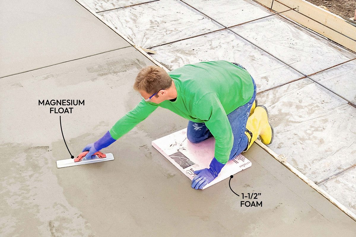 Wide vertical shot; Step - Smooth with Trowels; Wait until the concrete can support your weight before grooving the slab; Use 2-ft squares of 1-1/2 inch foam insulation as kneeling boards to distribute weight and start earlier; Groove every 10 ft on large slabs; After grooving, use a magnesium float to remove edging marks and smooth the surface; then finish with a steel trowel;