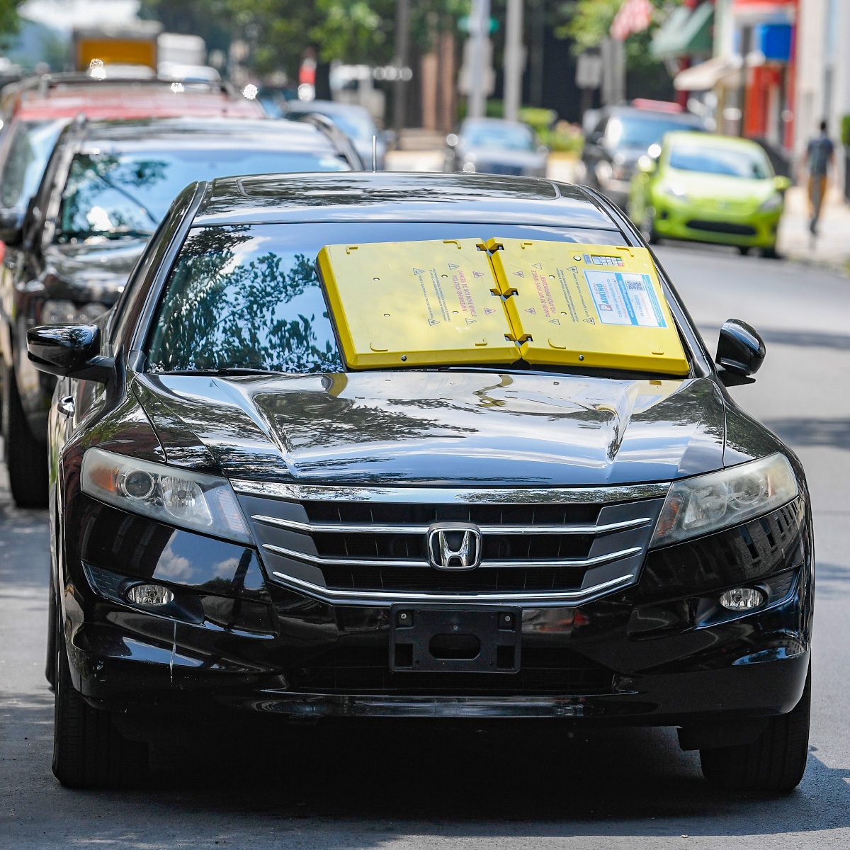 If You Spot This Yellow Device on Your Windshield, You’ve Been Barnacled