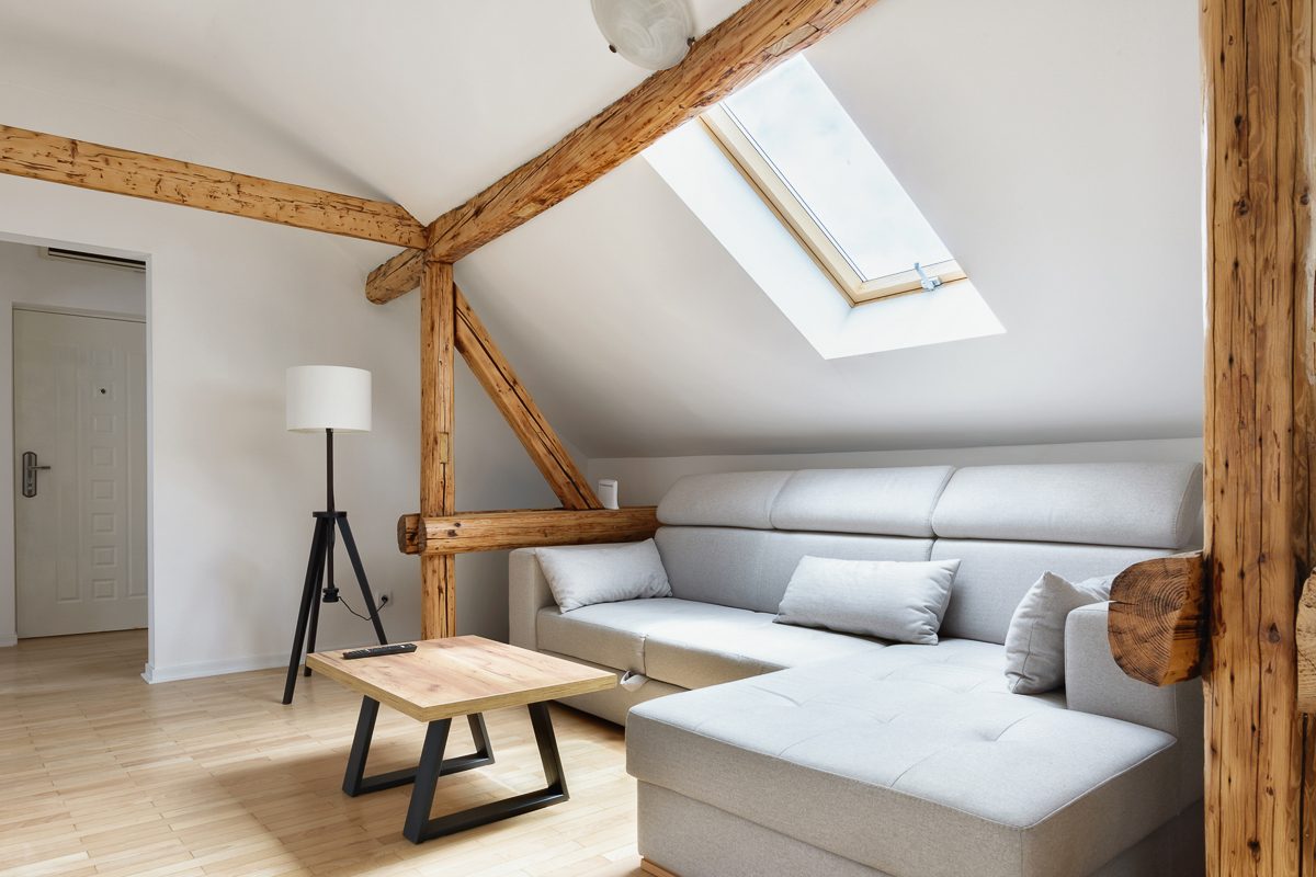 attic appartment with old rustic wooden beams