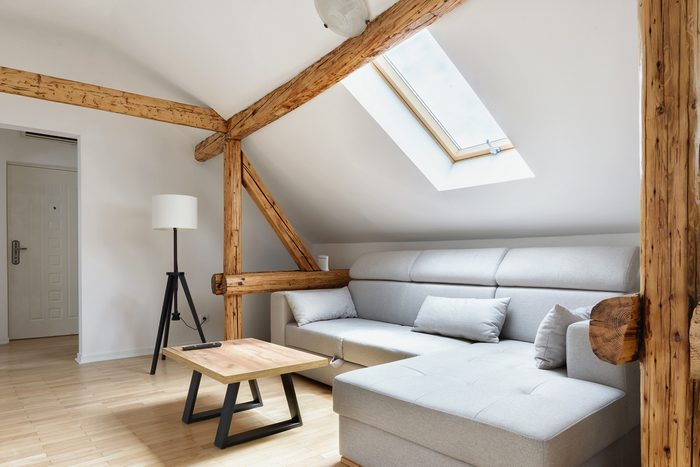 attic appartment with old rustic wooden beams