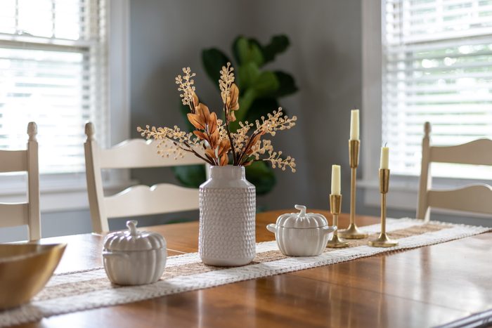 Dining room table with stylish fall decorations
