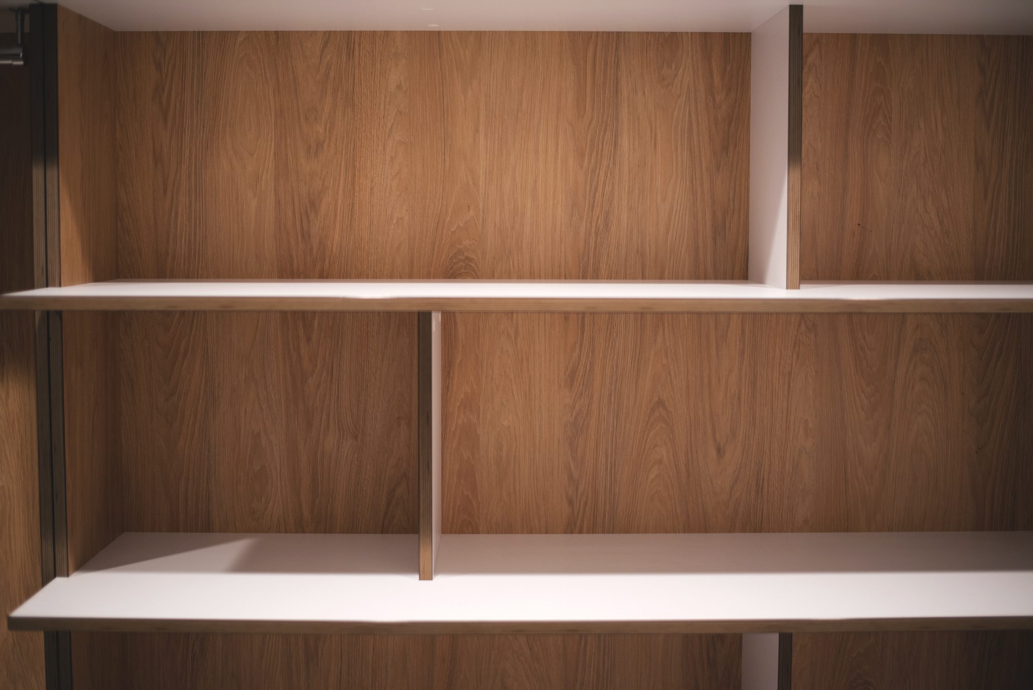 Dressing room with empty shelves. Wardrobe. Furniture. Interior design element.