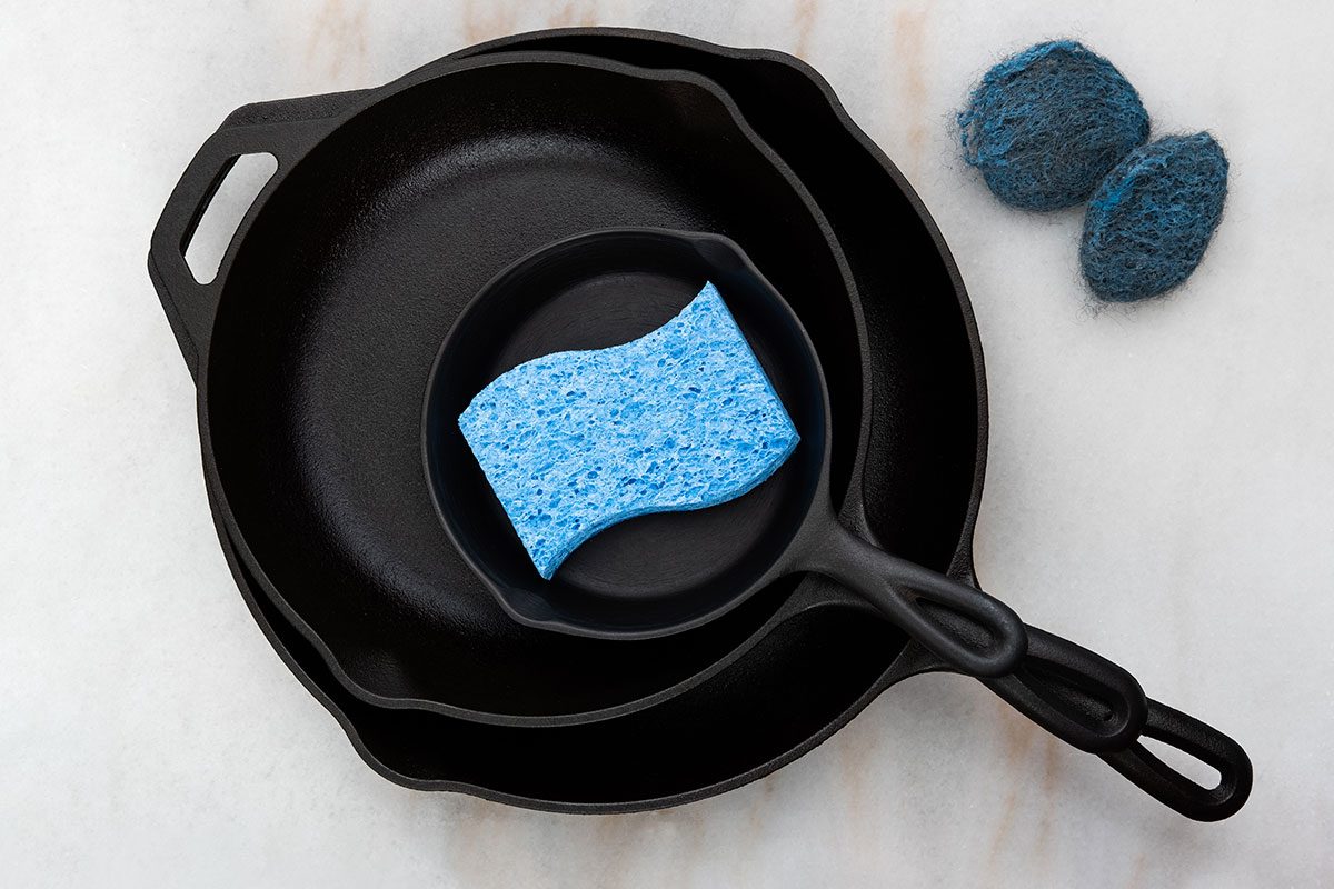 Cast Iron Cookware with cleaning supplies