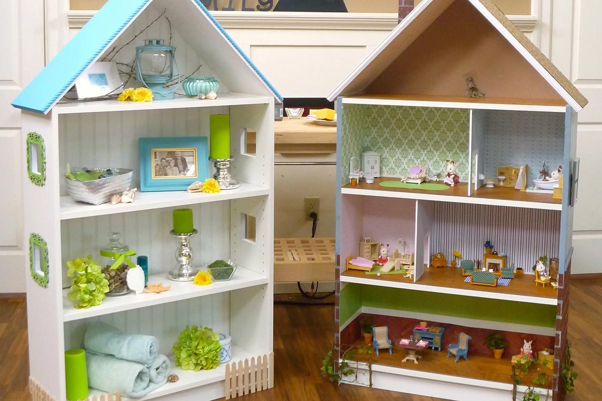 Two dollhouses made out of bookshelves