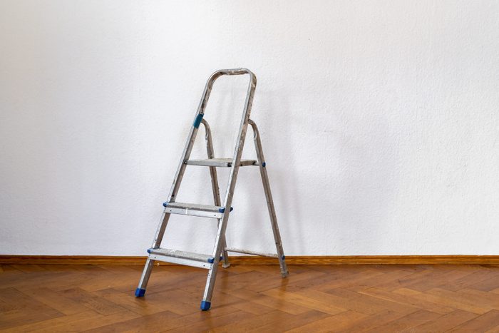 Home renovation concept - old room during restoration or refurbishment with white walls