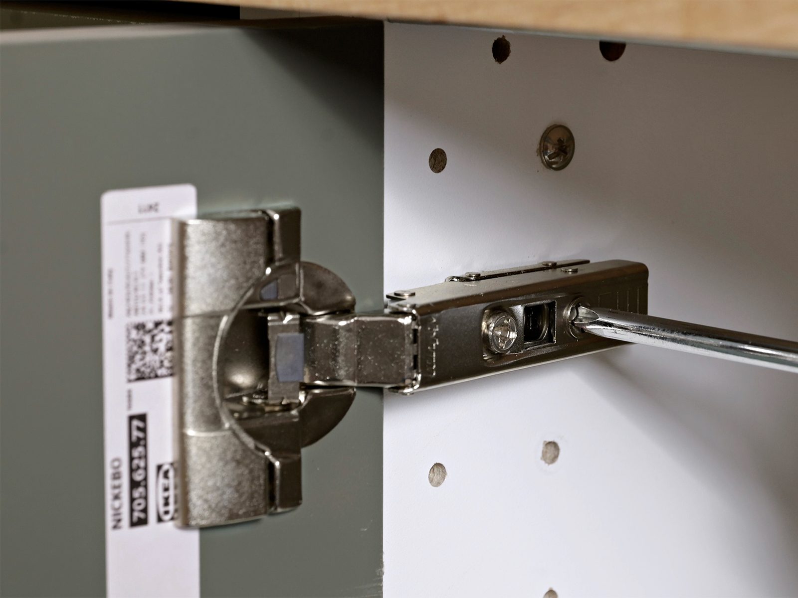 How To Fix Crooked Cabinet Doors In 4 Easy Steps- Adjust cabinet doors