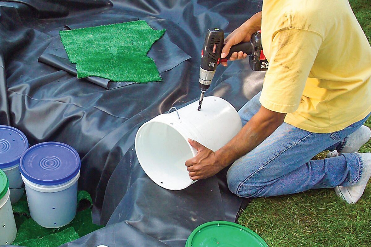 How To Build A Water Feature Thats Low Maintenance Drill Holes in the Buckets and Set Them in the Hole