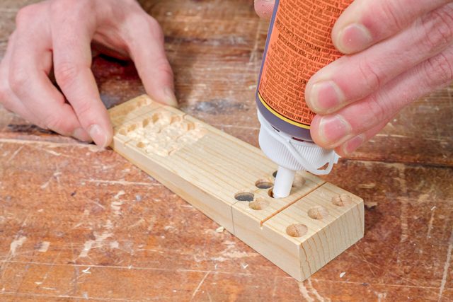 putting glue in wooden piece