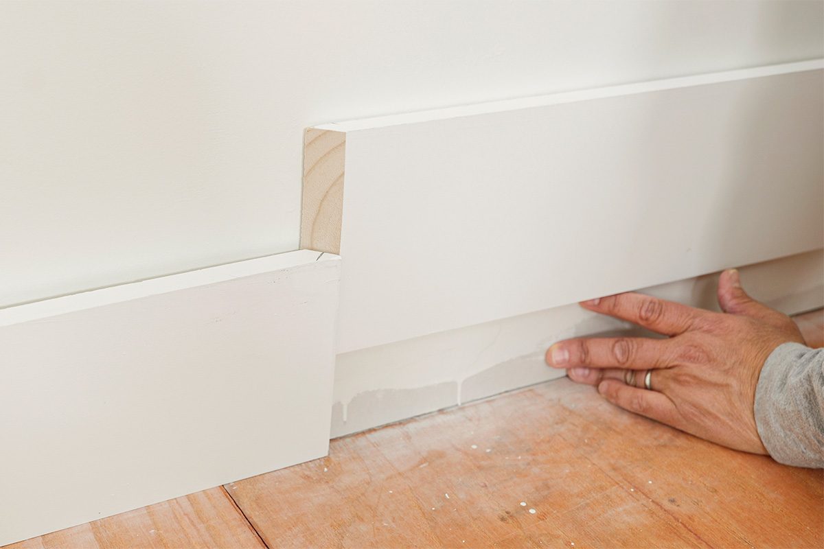 How To Install Baseboards Without Calling Your Dad Fhmvp25 Mf 05 27 Installbaseboards 3
