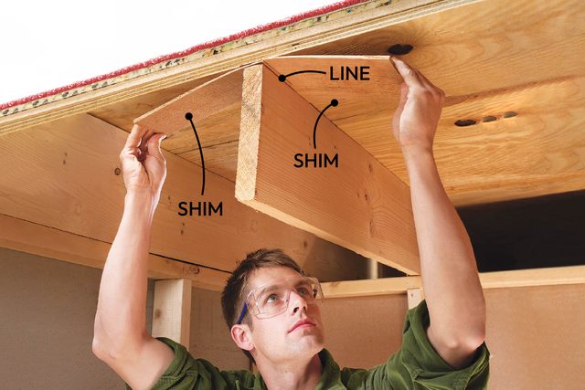 shim between joist and subfloor