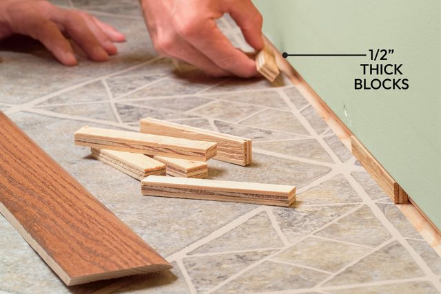 How To Install Baseboard Molding, Even On Crooked Walls