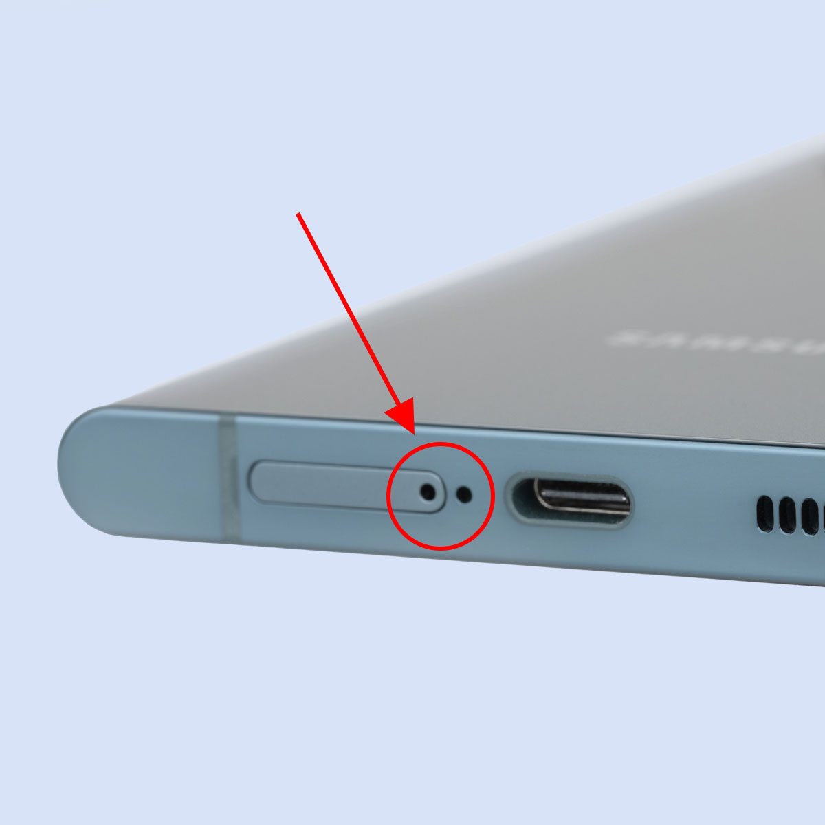 What Are the Tiny Holes on the Sides of My Phone For?